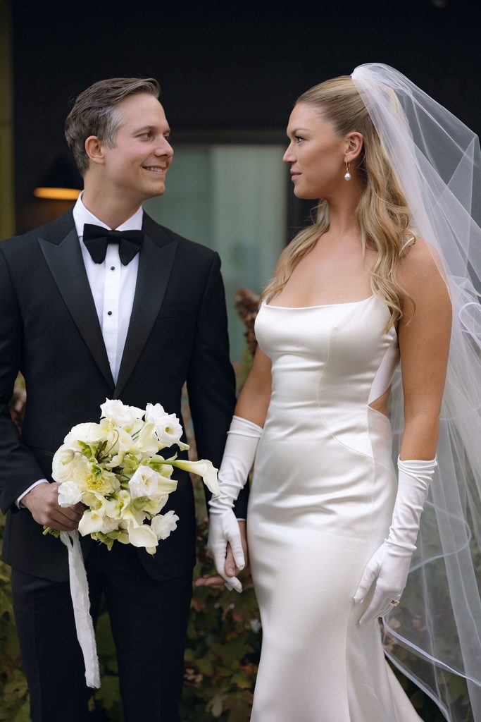 Elegant bride and groom in tux and dress